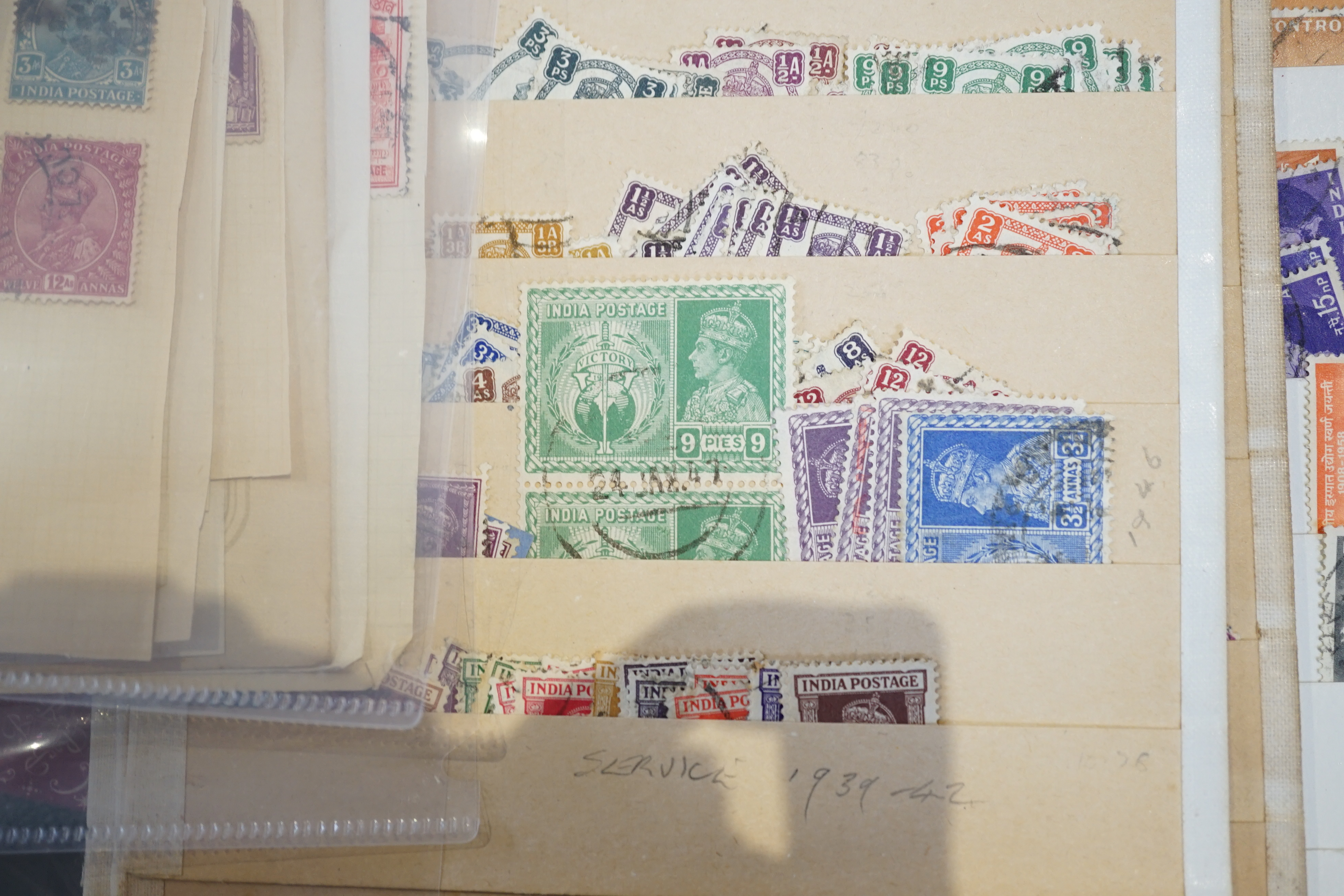 Three albums of Indian and Chinese stamps
